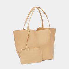 Mansur Gavriel tote bag in soft calf leather Flat shoulder straps  Open top with self-tie closure  Interior, leashed zip pouch bag Approx. 11.8"H x 21.5"W x 9"D Made in Italy Shopping Satchel With Smooth Grain And Double Handle, Shopping Smooth Grain Satchel With Double Handle, Daily Double Handle Smooth Grain Shoulder Bag, Chic Bags With Smooth Grain For On-the-go, Chic Smooth Grain Bags For On-the-go, Smooth Grain Satchel Shoulder Bag For Shopping, On-the-go Smooth Grain Tote Bucket Bag, Smooth Grain Tote Satchel For Shopping, Chic Smooth Grain Satchel For Shopping