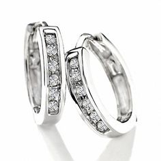 Enjoy a classic and versatile look with a sophisticated touch of shimmer when you wear these diamond huggie hoop earrings. Crafted in cool 10K white gold Each hoop sparkles with round diamonds along the front channel. Radiant with 0.10 ct. t.w. of diamonds These earrings secure with hinged backs. Gold Huggie Earrings, Diamond Huggie Earrings, Diamond Huggies, White Gold Hoops, Advantages And Disadvantages, Peoples Jewellers, Diamond Charm, Diamond Hoop Earrings, Huggie Earrings