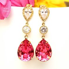 "Beautiful, romantic and sparkling Swarovski Crystal Teardrop Pink Earrings. The intricately detailed cool, crisp silver perfectly compliments the vibrant Rose Pink. I made these gorgeous Earrings with: - 18x13mm genuine Rose Pink Swarovski teardrop pear shaped fancy stones, set in sterling silver plated settings - Hypoallergenic and Tarnish resistant .925 Sterling Silver ear posts with AAA cubic zirconia stones - sparkling cubic zirconia connectors - these are approx 1 3/4\" top of the ear wire Pink Pear-shaped Earrings For Anniversary, Pink Pear-shaped Earrings For Gift, Pink Drop Bridal Earrings For Formal Occasions, Red Pear-shaped Wedding Earrings, Pink Teardrop Bridal Earrings For Party, Elegant Pink Teardrop Earrings For Party, Pink Teardrop Bridal Earrings As Gift, Pink Dangle Crystal Earrings For Wedding, Pink Teardrop Wedding Earrings