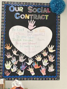 a bulletin board with handprints on it that says, our social contact is kind