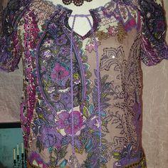 I Cant Say Enough About This Top! Beautiful Colors, Very Unique! Has A Tie At The Front Top, Has Light Elastic At The Arms & Top Of Top Area. Also, Has Different Embellishments Throughout The Top Hard To See In The Pictures. Like New, Never Worn But No Tags. Purple Bohemian Blouse For Spring, Bohemian Purple Blouse For Spring, Purple V-neck Bohemian Blouse, Casual Purple Blouse For Beach, Bohemian Purple Blouse For Beach, Bohemian Purple V-neck Tops, Fitted Bohemian Purple Tops, Fitted Purple Bohemian Tops, Purple Bohemian Tops For Festival