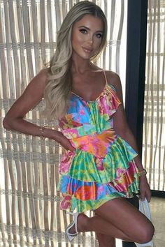 Description:This colorful printed mini is summer in a dress. Statement enough but not trend-led. floral dresses. for women with tastes. are basic for summer soirées or vacations. Featuring a plunging V neckline along with ruffles at front. adjustable spaghetti straps on the shoulders. a hidden zip closure at back. a high rise design at the waist. a swingy fit-and-flare silhouette with tiered ruffles in a short dress cut. this silky satin mini dress in our boutique is the perfect outfit for you beach holiday. or just for relaxing on the beach. Better yet. its satin fabric is polished enough that you can wear it year after year and look forward to dressing up as new every summer. Wear it on the weekend with your favorite sandals. Floral Dresses For Women, Mini Sundress, Custom Size Dresses, Multi Dress, Floral Sundress, Print Trends, Satin Mini Dress, Floral Dresses, Dress Cuts