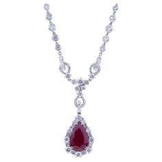 Pendant Drop Cut Ruby ct. 3.57, Diamonds Setting like a Royal Blood. Delicious Cut, Proportion and Brightness for the Ruby ct. 3.57 Vivid Red Pear-Shape Transparent. Diamonds around the Ruby and on the Chain are ct. 2.89 and Give to this Piece of Jewelry a Royal Aspect. The weight of 18kt Gold is 12.2 grams. Designed and Manufactured in Italy. Angeletti Boasts an Exceptional History Made of Pure Jewelry Tradition, a Blend of History and Modernity. Flagship store established in Piazza di Spagna / Red Pear, Royal Blood, Flagship Store, Pear Shape, Pear Shaped, Beautiful Jewelry, Jewelry Necklace Pendant, Ruby, Jewelry Accessories