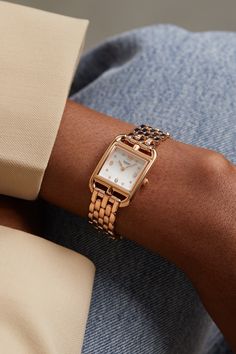 Hermès' 'Cape Cod' watches first debuted in the '90s, but the case's nautical  chain d'ancre  silhouette dates back to the '30s when Robert Dumas was at the helm - inspiration struck while strolling Normandy's coast. Elegantly simple and easy to read, it has a mother-of-pearl dial dotted with diamond indices and an 18-karat rose gold case, which has a warm, pink glow. Stack yours with fitted bracelets to avoid scratching the metal.     Each Hermès 'Cape Cod' watch comes with instructions on how