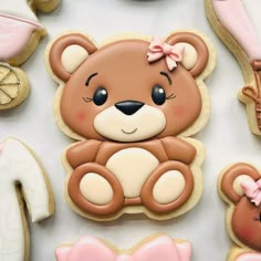 decorated cookies with teddy bears and baby items