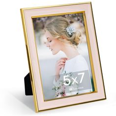 a pink and gold 5x7 photo frame with a woman's profile on it