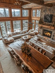 a living room filled with lots of furniture and a fire place in the middle of it