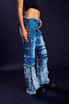 LAY LOW DISTRESSED DENIM FLARE PANT – AKIRA Fitted Distressed Denim Cargo Jeans, High Waist Bottoms With Frayed Hem For Festival, Fitted Distressed Flare Jeans In Rigid Denim, Stretch Denim Jeans For Festival, Festival Stretch Denim Jeans, Trendy Distressed Bottoms For Alternative Fashion, Distressed Jeans For Alternative Fashion In Spring, Trendy Deconstructed Bottoms For Spring, Trendy Bottoms With Frayed Hem For Festival