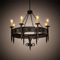 a chandelier with five candles hanging from it's center and four arms