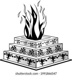 a cake with flames coming out of the top and on it's sides, in black and white