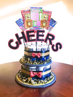 there is a cake that has been made to look like a tower with the words cheer on it