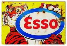 an image of a sign that says esso with a tiger holding it's head