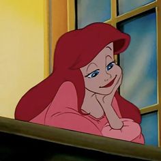 ariel from the little mermaid looking out an open window with her hand on her chin