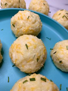 several balls of cheese on a blue plate