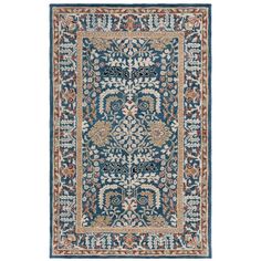 a blue rug with an intricate design on the front and back side, in various colors