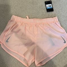 Never Before Worn! Light Pink Nike Running Shorts Size M Nike Spring Activewear Shorts, Nike Spring Activewear, Nike Shorts For Spring, Nike Athletic Shorts For Spring, Pink Athletic Shorts With Pockets For Spring, Nike Athleisure Shorts For Spring, Spring Sports Bottoms, Short Shape, Short Sports Bottoms For Spring, Nike Stretch Bottoms For Spring