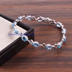 Blue topaz Bracelet, Topaz Bracelet, Sapphire Bracelet, Multi stone Bracelet, Bracelet for Mom, Natural stone Bracelet, Women's Bracelet Item Details Metal: 925 Solid Sterling Silver Product Name: Bracelet  Gemstone: Blue topaz :: Sapphire  Gemstone Size :: 7 X 5 MM Important note:-As we used Natural gemstone so gemstone color may sometime slightly different. Please Feel Free To Massage us. Free Shipping World Wide Payment Policy We accept payment through PayPal. If you are experiencing some dif Bracelet For Mom, Topaz Bracelet, Blue Topaz Bracelet, Peridot Stone, Natural Stone Bracelets, Bracelet Gemstone, Sapphire Bracelet, Name Bracelet, Sapphire Gemstone