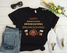 What makes fall, football, and family even better? Drinking! This funny, comfy Thanksgiving drinking t-shirt is the perfect top to wear on hayrides, apple picking, watching the parade with friends, eating leftovers, and everywhere! This classic unisex jersey short sleeve tee fits like a well-loved favorite. Soft cotton and quality print make users fall in love with it over and over again. These t-shirts have-ribbed knit collars to bolster shaping. The shoulders have taping for better fit over time. Dual side seams hold the garment's shape for longer.  .: 100% Airlume combed and ringspun cotton (fiber content may vary for different colors) .: Light fabric (4.2 oz/yd² (142 g/m .: Retail fit .: Tear away label .: Runs true to size Beer Turkey, Bartender Shirts, Turkey Trot, Pun Shirts, Food Shirt, Turkey Shirts, Bird Shirt, Gifts For Beer Lovers, Turkey Thanksgiving