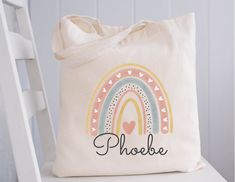 * This personalized name tote bag is the perfect gift for your friend, sister, mom or coworker.  *The bag measures 12 inch x 14.17 inch and is machine washable. ** You can send us your very own design ideas , logos or sayings. We love custom orders! *Printed using special sublimation ink and a heat press. *Made from 100% polyester *  Eco-friendly. *Come check out all our bags and other gifts here:  https://www.etsy.com/shop/pinkbow89?ref=seller-platform-mcnav *HOW TO PLACE YOUR ORDER - Enter the Personalized Multicolor Bags As Gifts, Multicolor Personalized Bags For Gift, Personalized Multicolor Bags, School Supplies Bag, Library Tote Bag, Library Tote, Rainbow Gift, Teacher Appreciation Gift, Eid Gifts