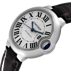 Cartier Ballon Bleu Steel Automatic Ladies Watch W6920085. Automatic self-winding movement. Caliber 076. Stainless steel case 33.0 mm in diameter. Fluted crown set with the blue spinel cabochon. Stainless steel smooth bezel. Scratch resistant sapphire crystal. Silver guilloche dial wth black Roman numerals. Blued steel sword shaped hands. Minute markers around an inner ring. Black leather strap with stainless steel deployant clasp. Cartier Timeless Watch With Skeleton Dial, Cartier Timeless Watch Accessories With Skeleton Dial, Cartier Watch Accessories With Skeleton Dial, Cartier Automatic Watch Accessories For Formal Occasions, Cartier Formal Watches With Skeleton Dial, Formal Cartier Watch Accessories With Skeleton Dial, Cartier Timeless Round Watch, Timeless Cartier Round Watch, Elegant Cartier Automatic Watch Accessories