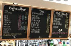 the menus are hanging on the wall behind the counter in the restaurant's coffee shop