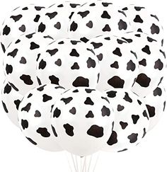 white and black polka dot balloons in the shape of hearts