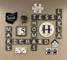 the wall is decorated with many different types of letters and numbers, including one that says home sweet home