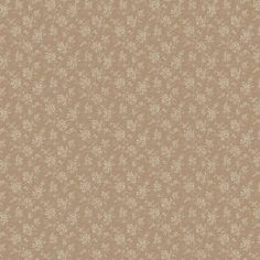 a brown wallpaper with white flowers on it