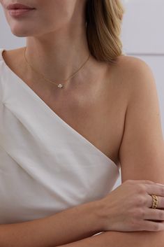 This diamond choker necklace features four round cut diamonds in a perfectly arranged cluster. It's set in an 18k gold chain, and would be perfect for layering. Fine Jewelry Solitaire Necklace With Flower Pendant, White Diamond Necklace With Delicate Chain, Elegant Choker With Single Cut Diamonds, Delicate White Diamond Necklace With Clavicle Chain, Delicate White Jewelry With Single Cut Diamonds, Elegant Single Cut Diamond Choker, White Diamond Choker Necklace, White Diamond Jewelry With Delicate Chain, Diamond Choker Necklace