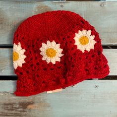 Bright Flowers Adorn This Cotton Blend Crochet Bucket Hat With A Wavy Brim. I’ve Added Additional Photos To Show The Various Ways You Can Wear This With The Clear, Wire That Runs Through The Brim To Adjust. 51% Cotton 49% Polyester Spot Clean Imported Bundle And Save! Retro Red Summer Hats, Yellow Knitted Crochet Hat For Spring, Red Crochet Hat For Spring, Red Brimmed Crochet Hat For Spring, Vintage Red Summer Hat, Fun Red Hat For Spring, Vintage Red Hat For The Beach, Red One Size Bucket Hat, Playful Red Summer Hat