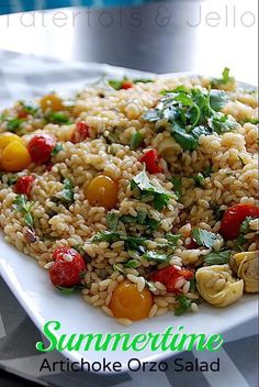 a white plate topped with rice and vegetables