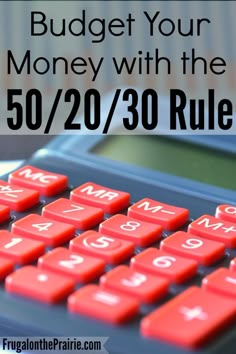 a red calculator with the words budget your money with the 50 / 20 / 30 rules