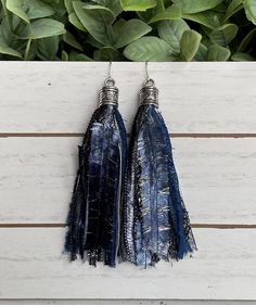 These vibrant tassel earrings will add the perfect pop of color to your wardrobe whether you're wearing a simple t-shirt and jeans or heading out in your favorite dress!  These fun earrings are made from carefully selected, high quality pieces of beautiful, rare novelty yarns.  The tassel part of the earring measures approximately 3 inches with a total drop length of 4 inches when including the earring end cap.  The end cap has a pretty antique heart pattern and the earring wire is stainless ste Blue Fringe Earrings For Festivals, Bohemian Blue Fringe Tassel Earrings, Elegant Blue Tassel Earrings For Festival, Blue Tassel Drop Earrings For Festival, Trendy Blue Tassel Drop Earrings, Blue Fringe Tassel Drop Earrings, Trendy Blue Tassel Earrings With Fringe, Trendy Blue Fringe Earrings, Silver Bohemian Tassel Earrings With Fringe