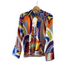 Zara Multi Color Satin Shirt Geometric Abstract Print Size Xsmall Nwt This Gorgeous Luxurious Zara's Shirt Is Colorful And Has A Very Unique Avant Garde Style Print. This Beautiful Satin Shirt Is A Stylish Addition To Your Wardrobe. Tailored In 100% Polyester, This Lightweight Airy Blouse Boasts A Unique Mix Of Abstract, Floral, And Geometric Patterns. Brand: Zara Color: Multi Size: Xs Style: Colorful, Summer, Business Casual, Festival, Bohemian, Lux Pattern: Abstract, Floral, Geometric Material Chic V-neck Top With Bold Print, Trendy Blue Abstract Print Top, Trendy Blue Top With Abstract Print, Chic Blue Top With Abstract Print, Long Sleeve Tops With Abstract Print For Work, Fall Multicolor V-neck Shirt, Blue Blouse With Abstract Print For Fall, Fitted V-neck Blouse In Multicolor Print, Spring Purple V-neck Shirt