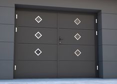 an image of a modern garage door with diamond designs on the front and side panels