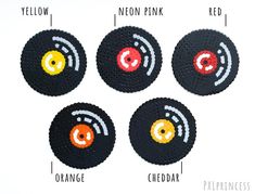 four circles with different colors on them and the words yellow, red, orange, and black