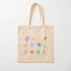 100% cotton reusable shopping carry bag with digital print on one side. Super cute pastel flower design <3 Cute Cotton Bags For Spring, Trendy Cotton Bags With Floral Print, Trendy Cotton Canvas Bag For Spring, Cotton Shopping Bag With Floral Print, Cute Multicolor Cotton Bags, Pink Floral Print Cotton Bag, Cotton Tote Bags With Floral Print, Spring Cotton Canvas Gift Bag, Multicolor Cotton Bags For Spring