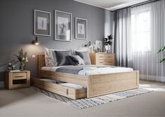 a bedroom with a bed, nightstands and two pictures on the wall above it