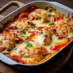 a casserole dish filled with meat and vegetables