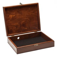 an open wooden box with black felt inside