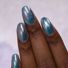 New Day is an icy blue nail polish with a gorgeous holographic sparkle!  With an intense metallic sparkle, New Day is blindingly beautiful in the sun and refreshingly cool indoors. Look closely and you’ll also catch hints of a stunning blue sparkle dancing across your nails.  Last but not least, a very precise holographic accent brings it all together to give New Day a truly magical finish!  New Day is part of ILNP’s Ultra Metallics® class of incredibly vivid metallic finish nail polishes; speci Nails Blue Sparkle, Beachy Nail Designs, Ilnp Nail Polish, Boutique Nails, Beachy Nails, Holographic Blue, Metallic Nail Polish, Metallic Nail, Silver Holographic