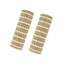 two pairs of beige and white striped hair clips on a white background with clippings