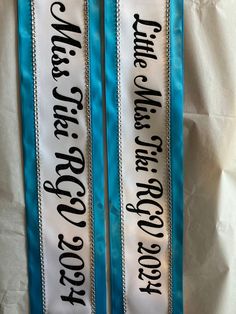 You are getting ONE custom sash :) Perfect Birthday Sash, Halloween costume Prop, pageant sash, bachelorette party Decor, Baby Showers or making any occasion a little more Personal , Fun , and Unique!  Each Sash is made of Satin Ribbon and heat pressed vinyl.  Wrap around Sash , Closed at the hip with a pin so the size can be easily adjusted  27 Inches from hip to shoulder (we can add length at no charge if needed bigger). Sashes are approx. 2.5" wide and *if it has a border color it is closer to 3"  Thanks For your Business! Rodeo Queen Sash, Fitted Rhinestone Sashes For Party, Miss Universe Sash, Formal Crystal Rhinestone Sash, Beauty Pageant Sashes, Silver Rhinestone Party Sashes, Miss Understood, Bridal Sash Bachelorette, Pageant Sashes