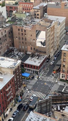 an aerial view of a city with tall buildings