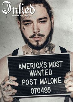 a man holding up a sign that says america's most wanted post - malone