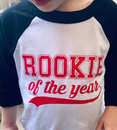 Baseball Tee with red sleeves and red vinyl design! Unisex Fit. When in doubt, size up! Hand-Pressed just outside of Dallas, Texas by Hannah Amazon! Washing process- please wash inside out on cold and hang dry for best results. Free shipping on all orders within the US! Rookie Of The Year, Red Vinyl, Raglan Tee, Red Design, Dallas Texas, Vinyl Designs, Baseball Tee, Dallas, The Year