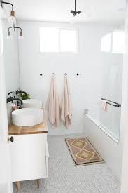 a bathroom with a sink, toilet and bathtub