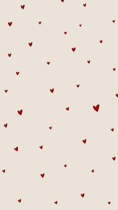 red hearts flying in the air on a white background