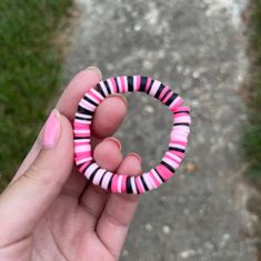 A pink and black clay bead bracelet wich is designed to fit young girls and teens!! Cheap Pink Polymer Clay Beaded Bracelet, Hot Pink Clay Bead Bracelet, Pink Round Beads Bracelets, Fun Style, Pink Fun Bracelets With Round Beads, Pink Plastic Round Beads Jewelry, Pink Plastic Round Bead Jewelry, Fun Pink Bracelets With Round Beads, Pink Plastic Round Beaded Jewelry, Pink Plastic Bracelets For Friendship