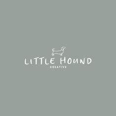 the little hound creative logo is shown on a gray background with white lettering and a dog's head